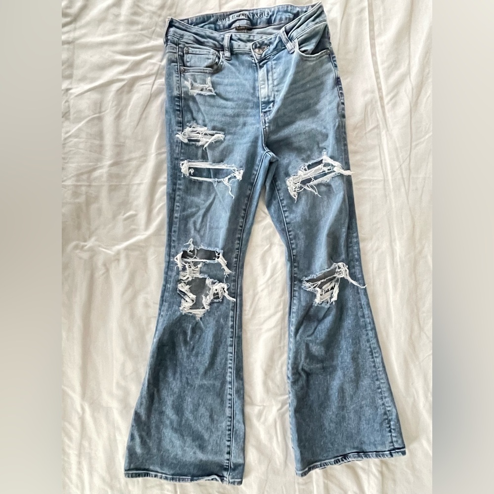 AmericanEagle next level ripped high-waisted flare jeans